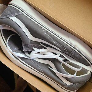 Grey and white old skool vans